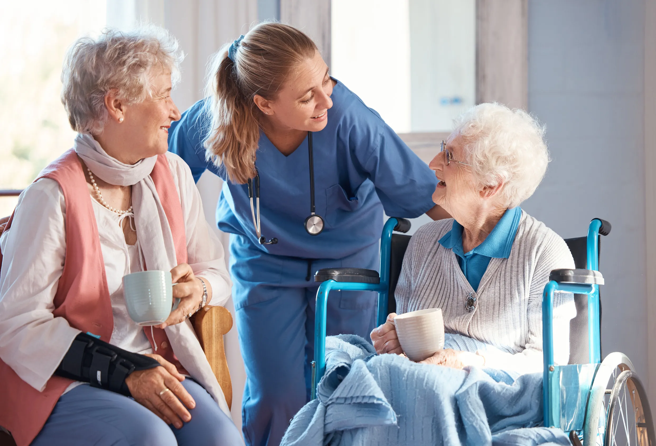 Nursing home, care and nurse with senior women doing healthcare checkup, examination or consultation